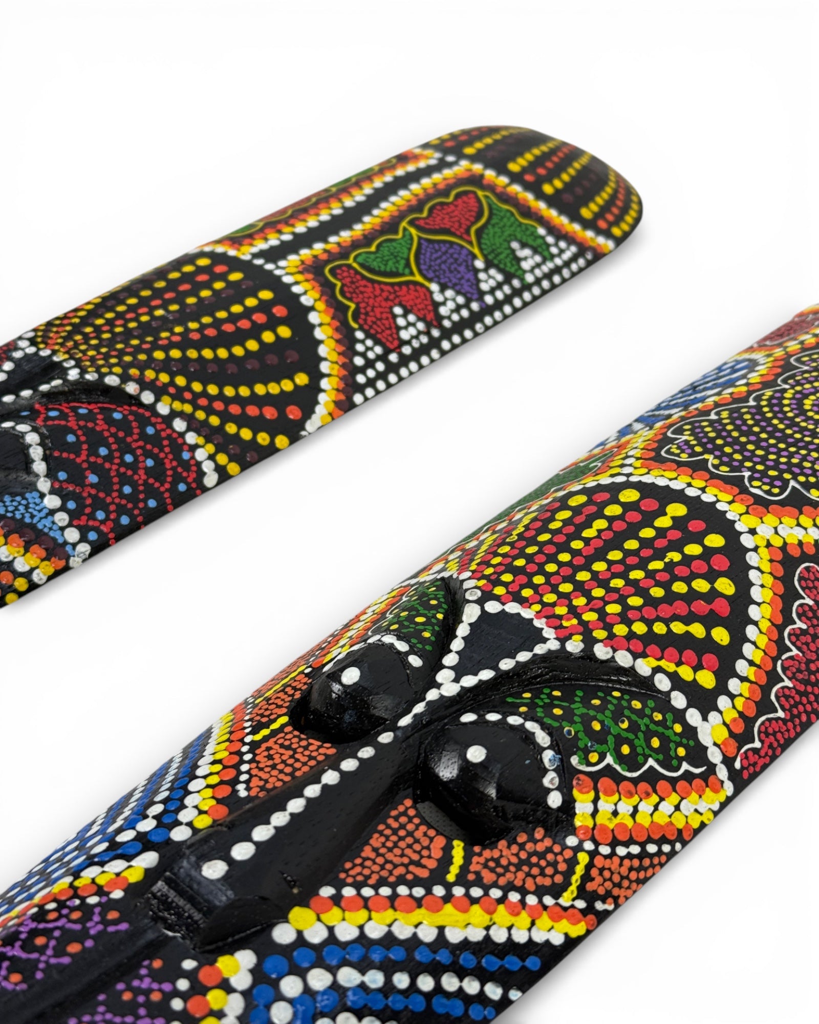 Unique piece: Handmade teakwood mask with a colorful polka dot pattern