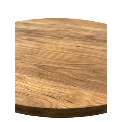 Round teak dining table: natural design and robust quality